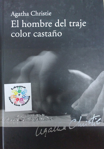 El Hombre del traje color castaño